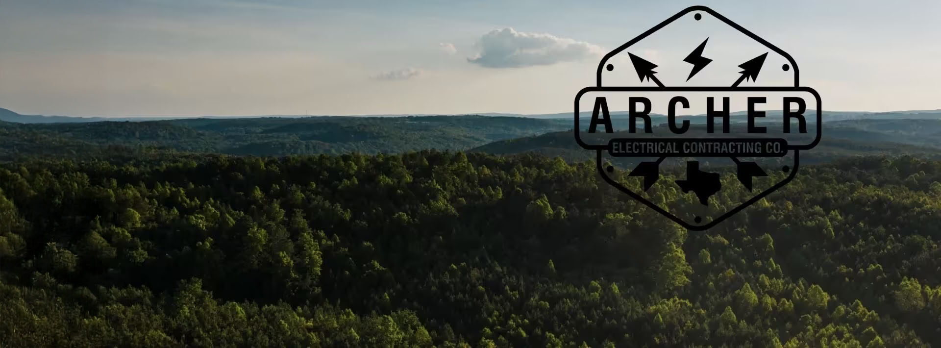 Aerial landscape with Archer Electrical branding